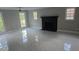 Bright living room with tile flooring and a black fireplace at 1947 Kensington High Sw St, Lilburn, GA 30047