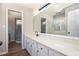 Bright bathroom with double vanity, modern finishes, and a glass-enclosed shower at 2830 Jodeco Dr, Jonesboro, GA 30236