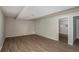 Unfinished basement space with hardwood floors and natural light, ideal for customization at 336 Rockmoor Trl, Marietta, GA 30066