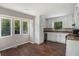 Bright kitchen features white cabinets, granite countertops, and a breakfast nook with natural light at 336 Rockmoor Trl, Marietta, GA 30066