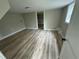 Bedroom featuring neutral walls and attractive wood-look floors at 1691 Flat Shoals Rd, Atlanta, GA 30316