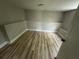 Neutral bedroom with wood-look floors and a clean, simple aesthetic at 1691 Flat Shoals Rd, Atlanta, GA 30316