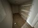 Storage area with shelves and tile flooring at 1691 Flat Shoals Rd, Atlanta, GA 30316