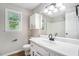 Bathroom featuring a white vanity, new fixtures, and natural light at 3333 Devaughn Ne Dr, Marietta, GA 30066