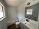 Renovated bathroom featuring modern fixtures, a shower-tub combo, and sleek vanity at 3417 Hollow Tree Dr, Decatur, GA 30034
