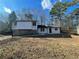 Charming single-Gathering home with stone accents and fresh white paint job at 3417 Hollow Tree Dr, Decatur, GA 30034