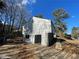 View of the garage, located on the side of this lovely home, with black framed glass doors at 3417 Hollow Tree Dr, Decatur, GA 30034