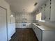 Well-lit kitchen with white cabinetry, new appliances, and sleek countertops at 3417 Hollow Tree Dr, Decatur, GA 30034