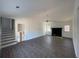 Open-concept living room featuring a decorative fireplace and light-filled windows at 3417 Hollow Tree Dr, Decatur, GA 30034