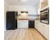 Efficient kitchen with stainless steel appliances and white cabinetry at 3436 Lake Monroe Rd, Douglasville, GA 30135