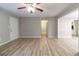 Bright living room showcasing the flooring and neutral wall color scheme at 3436 Lake Monroe Rd, Douglasville, GA 30135