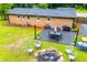 Brick home with an outdoor entertainment area at 4529 Lakeview Dr, Powder Springs, GA 30127
