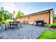 Spacious backyard featuring a patio set, BBQ grill, and manicured lawn, ideal for entertaining at 4529 Lakeview Dr, Powder Springs, GA 30127