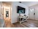 Bright foyer showcasing wood floors, modern decor, and a welcoming entrance at 4529 Lakeview Dr, Powder Springs, GA 30127