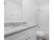 Bright bathroom featuring a granite vanity, ample storage, and a clean, well-maintained shower-tub combo at 5444 Wylstream, Norcross, GA 30093
