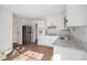 Kitchen with white cabinets, stainless steel appliances, and updated countertops at 7935 Sweetwater Dr, Douglasville, GA 30135