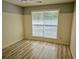 Bedroom with durable light-colored floors and wainscoting at 110 Orleans Blvd, Mcdonough, GA 30253