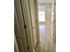 Hallway with durable light-colored floors and white doors at 110 Orleans Blvd, Mcdonough, GA 30253