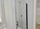 New, renovated shower with dark-framed glass doors and tiled walls at 110 Orleans Blvd, Mcdonough, GA 30253