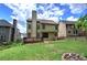 Spacious backyard with a well-maintained lawn and a wooden deck at 233 Yorkshire Ln, Villa Rica, GA 30180