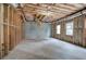 Unfinished basement with exposed insulation, ready for customization and finishing at 233 Yorkshire Ln, Villa Rica, GA 30180
