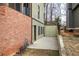 Finished basement area with a concrete patio, offering additional living space at 233 Yorkshire Ln, Villa Rica, GA 30180