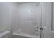 Bright bathroom with a shower and tub that provides a functional space at 233 Yorkshire Ln, Villa Rica, GA 30180