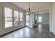 Bright dining room featuring backyard views and an open floor plan that leads to living room at 233 Yorkshire Ln, Villa Rica, GA 30180