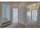 Upstairs hallway with doors leading to bedrooms or bathrooms, all neutrally painted at 233 Yorkshire Ln, Villa Rica, GA 30180