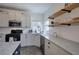 Bright kitchen featuring stone countertops and stainless appliances at 233 Yorkshire Ln, Villa Rica, GA 30180
