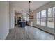 Charming kitchen and eating area featuring natural light, an island, and backyard views at 233 Yorkshire Ln, Villa Rica, GA 30180