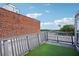 Rooftop balcony features an artificial grass area and views of the surrounding neighborhood at 322 Peters Sw St # 6, Atlanta, GA 30313
