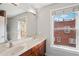 Well-lit primary bathroom with double sinks, vanity, and a large mirror at 322 Peters Sw St # 6, Atlanta, GA 30313