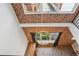 Unique architectural ceiling design with a modern chandelier in the expansive, light-filled room at 322 Peters Sw St # 6, Atlanta, GA 30313