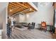 Bright living room with hardwood floors, exposed ceiling and staircase to loft area at 322 Peters Sw St # 6, Atlanta, GA 30313