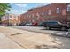 Rear of building with a parking lot featuring multiple parking spaces at 322 Peters Sw St # 6, Atlanta, GA 30313