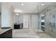 Bright, modern bathroom with shower, tub, and granite-topped vanity at 3325 Piedmont Ne Rd # 3005, Atlanta, GA 30305