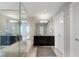 Bright bathroom with dual vanities, soaking tub, and glass-enclosed shower at 3325 Piedmont Ne Rd # 3005, Atlanta, GA 30305