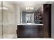 Bathroom with glass shower, modern vanity, and a decorative statue at 3325 Piedmont Ne Rd # 3005, Atlanta, GA 30305
