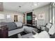 Modern bedroom featuring reading nook, track lighting, dark wood floors and en-suite bathroom at 3325 Piedmont Ne Rd # 3005, Atlanta, GA 30305