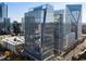 Stunning view of glass highrise buildings against a clear sky, showcasing modern architecture and urban landscape at 3325 Piedmont Ne Rd # 3005, Atlanta, GA 30305
