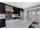 A chef's kitchen showcases modern stainless steel appliances, an island with seating, and a sleek design at 3325 Piedmont Ne Rd # 3005, Atlanta, GA 30305