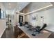 Open-concept living room with recessed lights, artwork, and contemporary seating arrangement on a textured rug at 3325 Piedmont Ne Rd # 3005, Atlanta, GA 30305