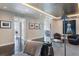 Open living room with hardwood floors, custom ceiling, recessed lights, and artwork at 3325 Piedmont Ne Rd # 3005, Atlanta, GA 30305