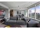Stylish living area featuring comfortable seating, modern decor, and expansive windows with scenic city views at 3325 Piedmont Ne Rd # 3005, Atlanta, GA 30305