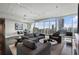 Bright living space with city views, modern furniture, and an open layout perfect for entertaining at 3325 Piedmont Ne Rd # 3005, Atlanta, GA 30305