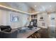 Modern living room with recessed lighting, accent wall, and a sleek sitting area with comfortable chairs at 3325 Piedmont Ne Rd # 3005, Atlanta, GA 30305