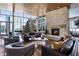 Comfortable lobby seating with a beautiful stone fireplace and large windows at 3325 Piedmont Ne Rd # 3005, Atlanta, GA 30305
