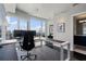 Bright office space with floor-to-ceiling windows offering city views and modern minimalist decor at 3325 Piedmont Ne Rd # 3005, Atlanta, GA 30305
