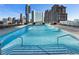 Rooftop pool with stairs and views of the city skyline at 3325 Piedmont Ne Rd # 3005, Atlanta, GA 30305